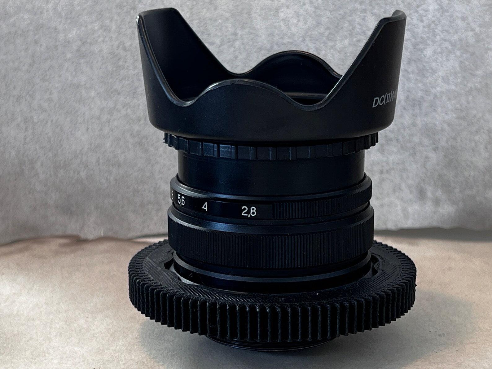 Mir-1B 1V 37mm f2.8 Wide Soviet USSR lens with any adaptor of your choice.