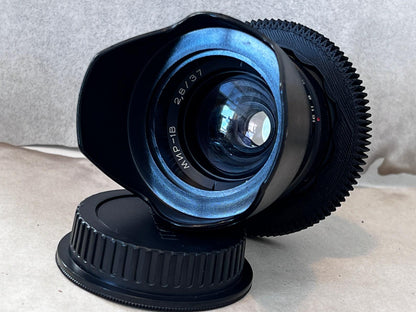 Mir-1B 1V 37mm f2.8 Wide Soviet USSR lens with any adaptor of your choice.